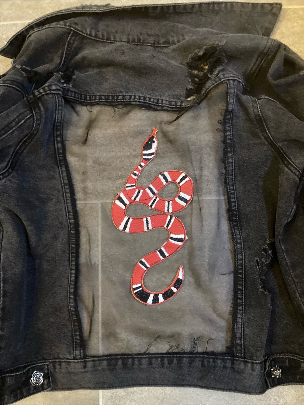 “Wisdom” Black Distressed Denim Jacket with Red Snake Appliqué - Picture 3 of 9